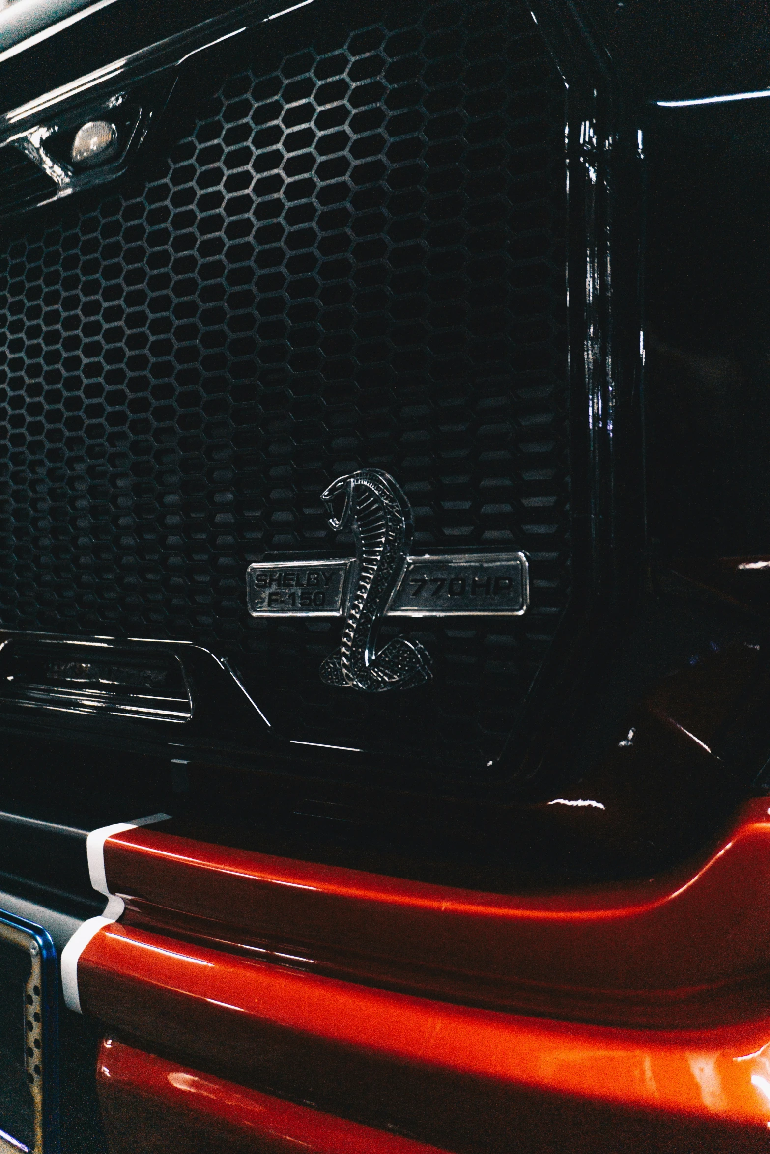 a close up of a truck's grill and grille