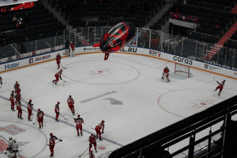 a hockey team is on the ice during an ice rink