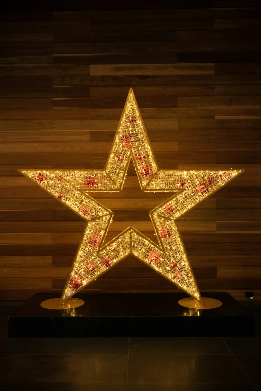 an image of a lighted star that is on the floor