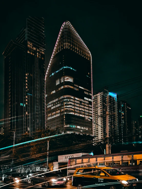 a very tall building sitting on top of a hill