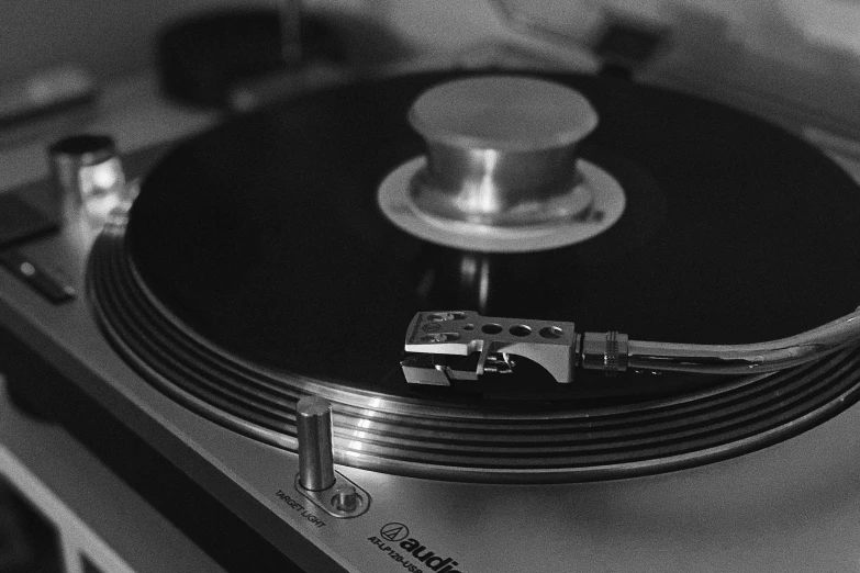 a black and white po of a turntable