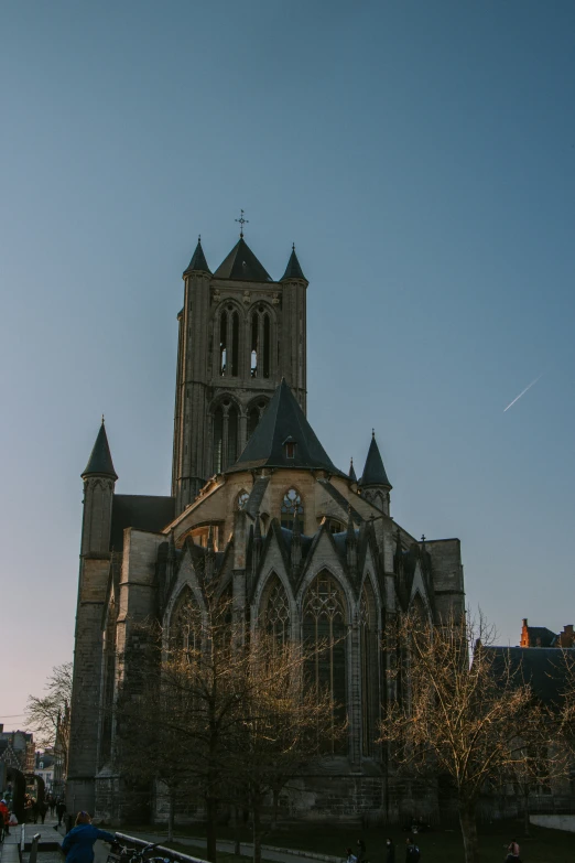 a po of a tall church against the blue sky