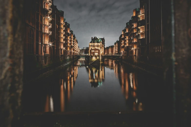 a very long body of water near some tall buildings