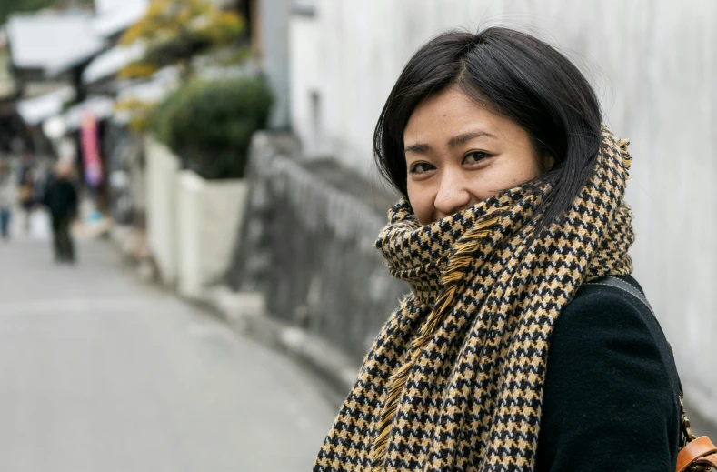 a woman with a scarf on her head