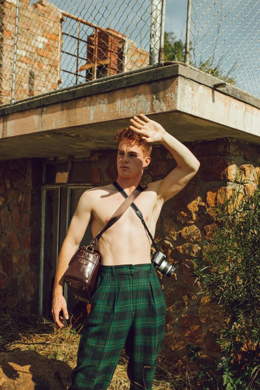 a person standing on top of a brick wall