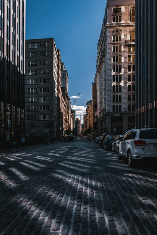 the car has passed through a wide empty city street