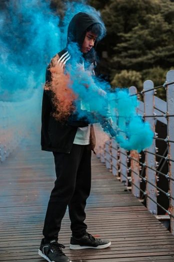 a man with blue colored powder on his body