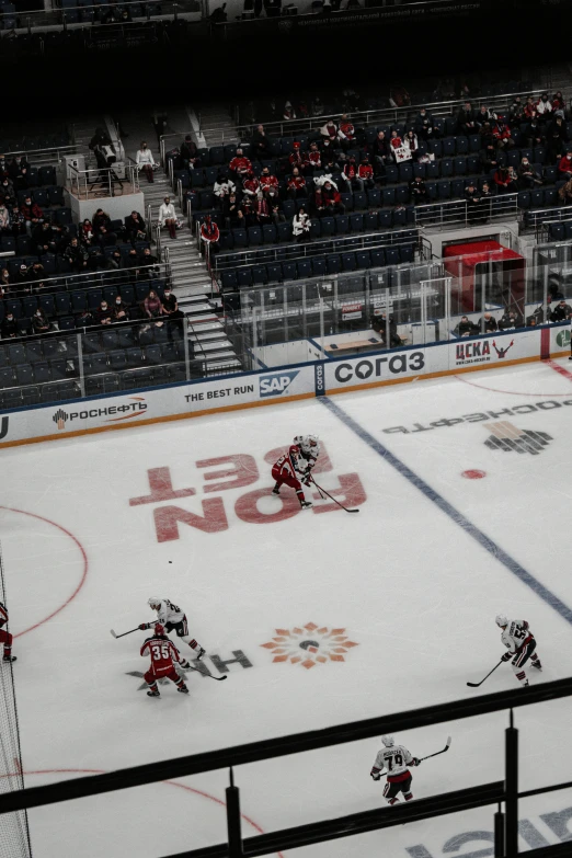 the view of a hockey game from the balcony