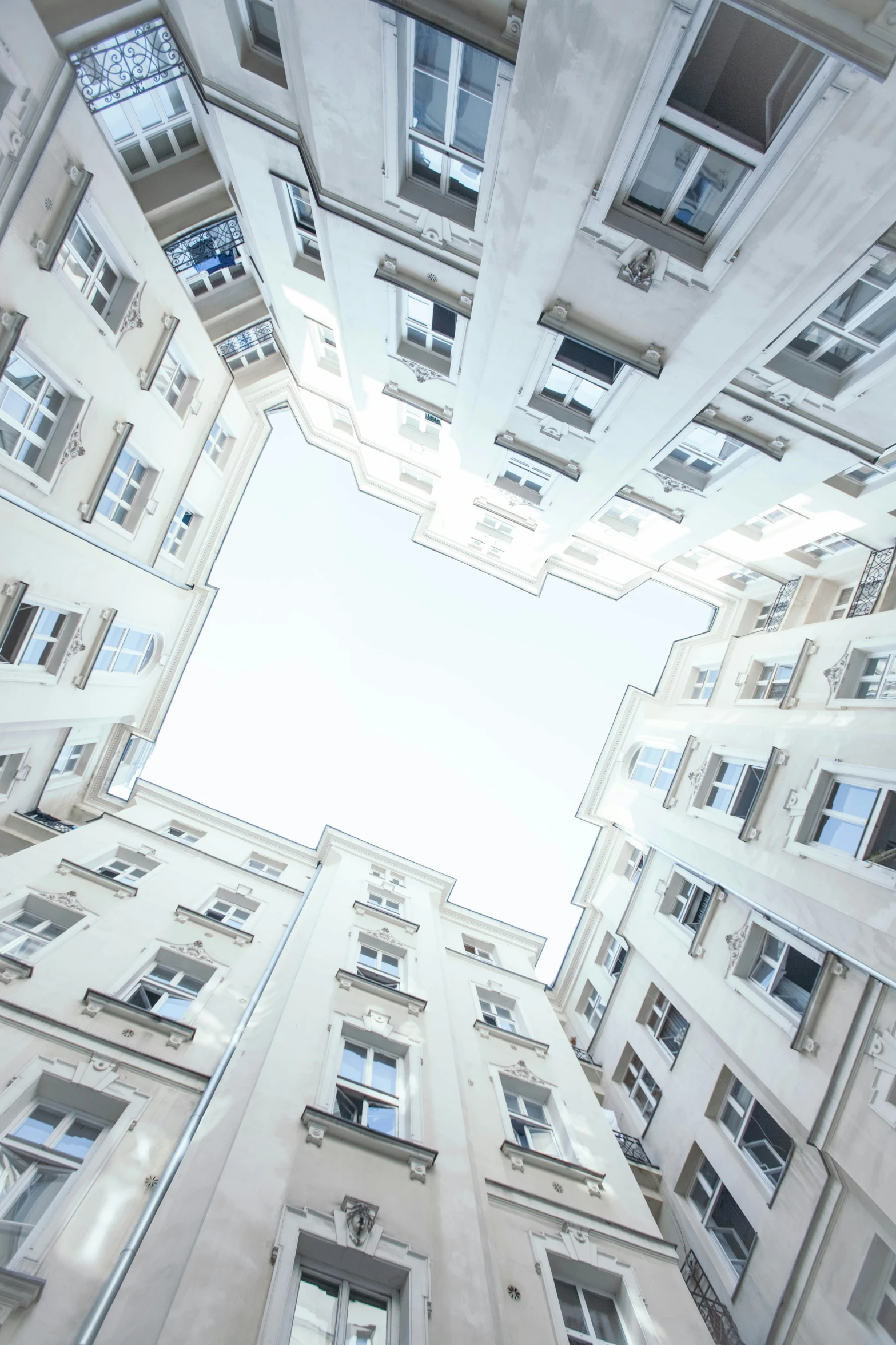 a tall building is shown looking upward in an angle