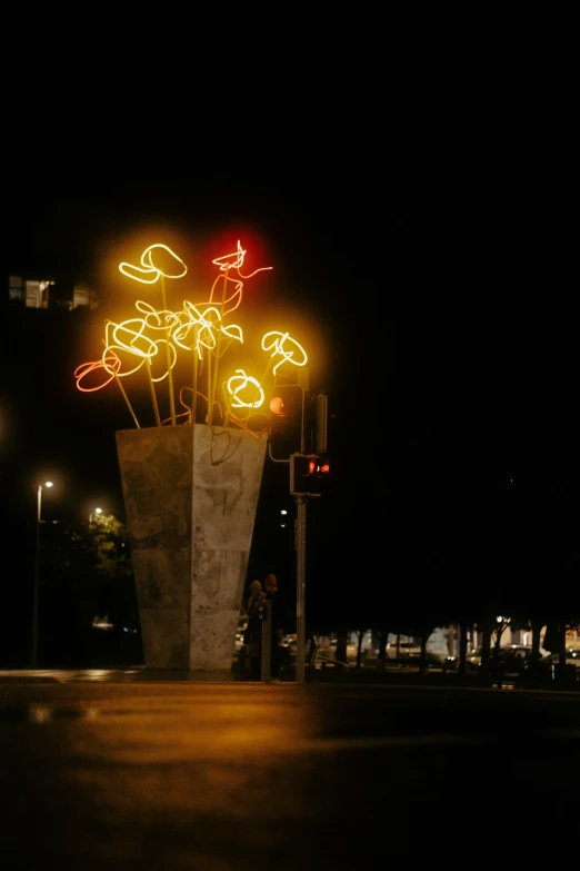 neon lights and lights up the night at a city street corner