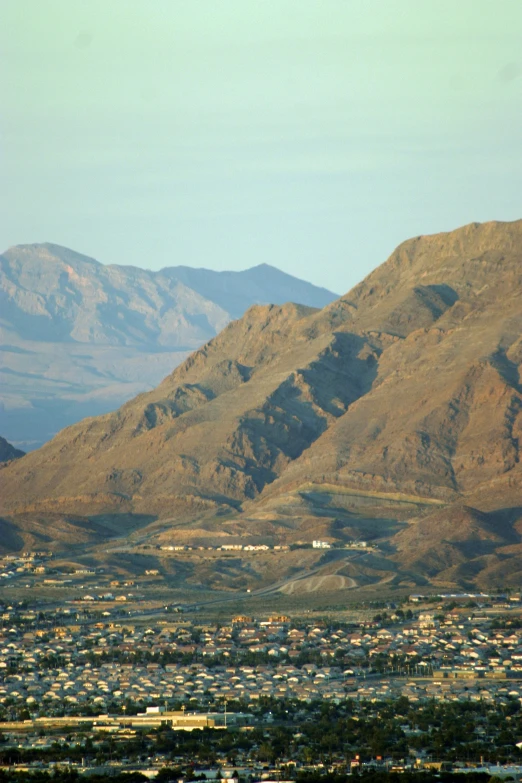 a view of a city near a mountain range