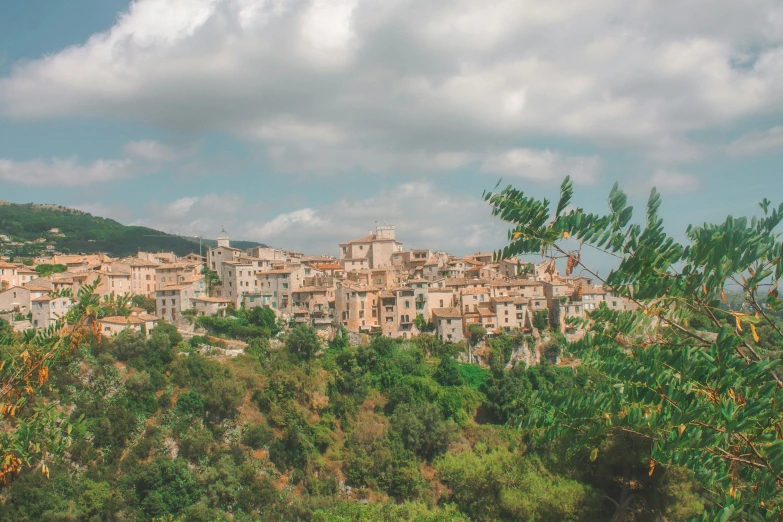 a brown village sits on the side of the road