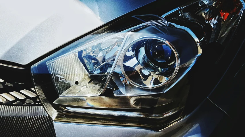 this is the view of a chrome car headlight
