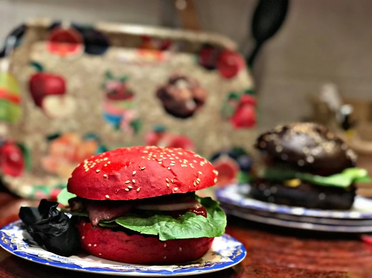 a hamburger sitting on top of a white plate