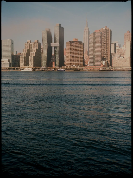 city skyline seen from across the water on an island