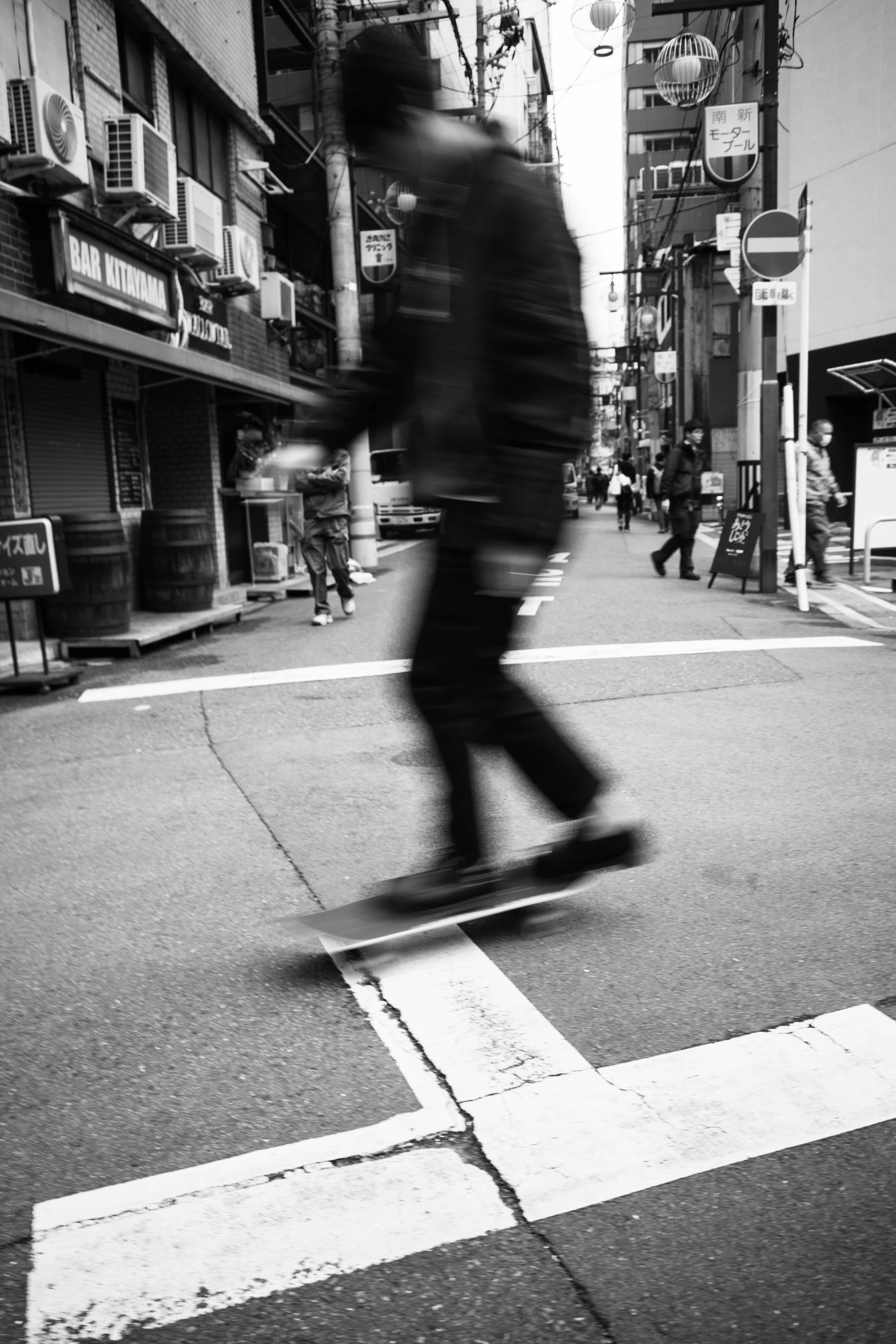 a man is riding his skateboard in the street