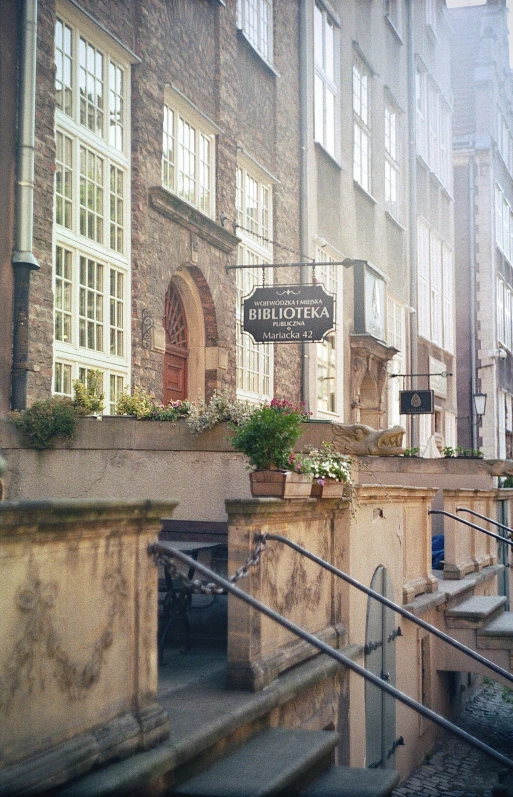 a street with lots of tall buildings on it's sides