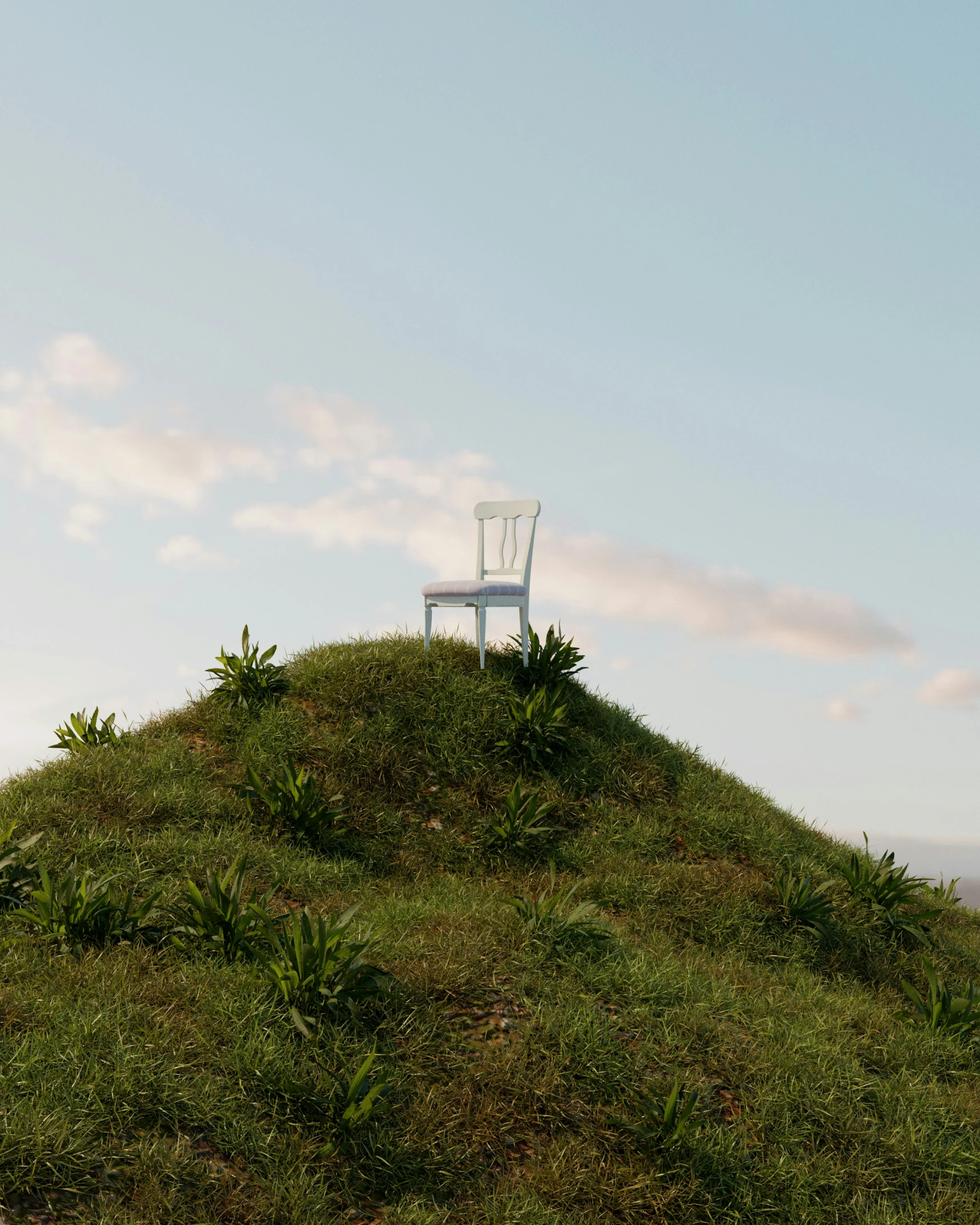 a lone chair sitting on a hill