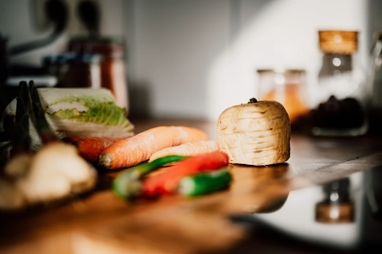 an arrangement of vegetables are on the table