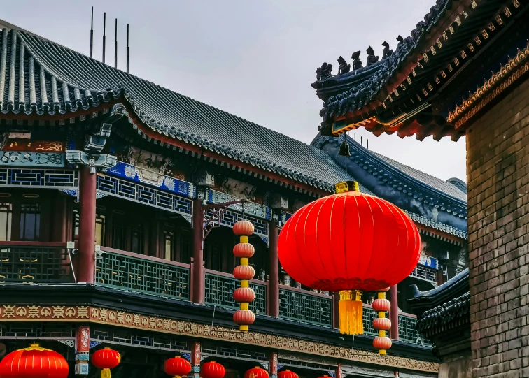 an image of oriental building that has decorations on it