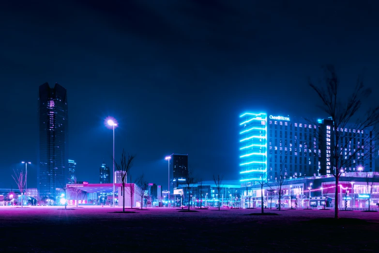 some buildings in the background and lights in the foreground