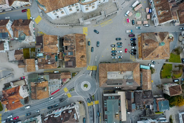 aerial s of cars driving down an intersection