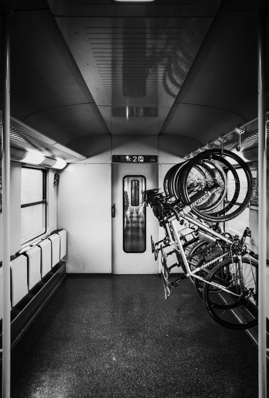 there are two bicycles sitting in the side room