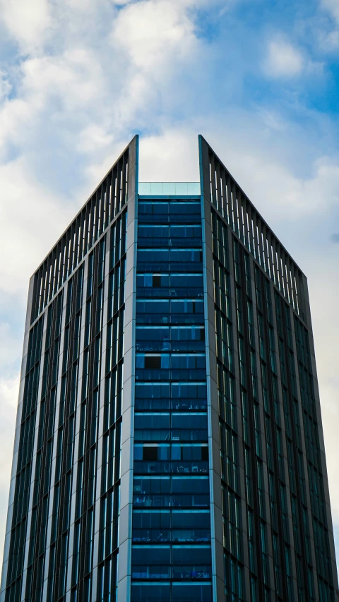 a tall skyscr building has two sides divided