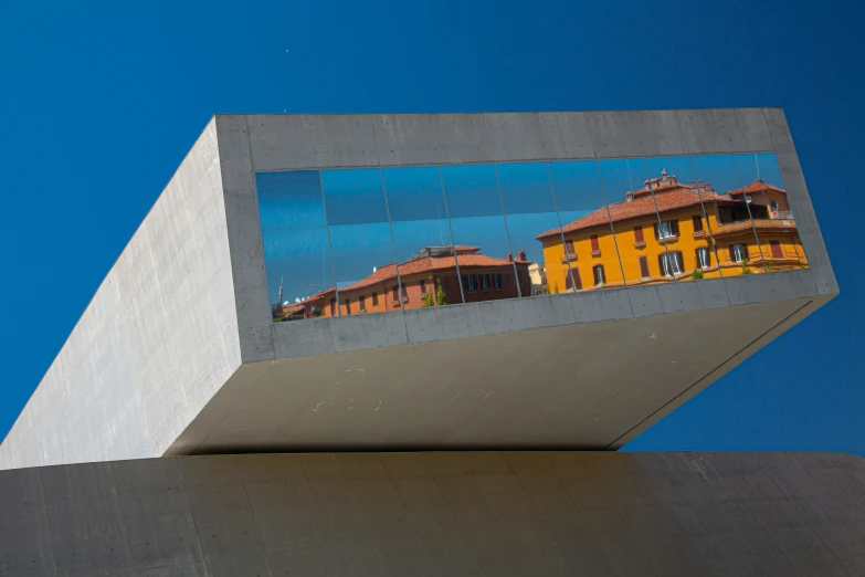 an art piece with a view of buildings