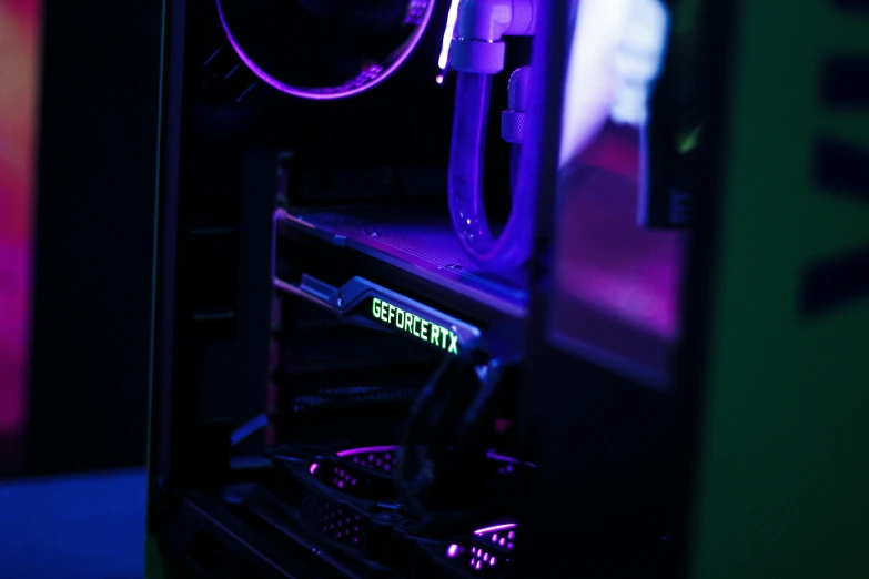 a dark background with black and purple lights and a fan