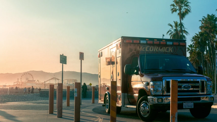 the truck is driving down the street with no passengers