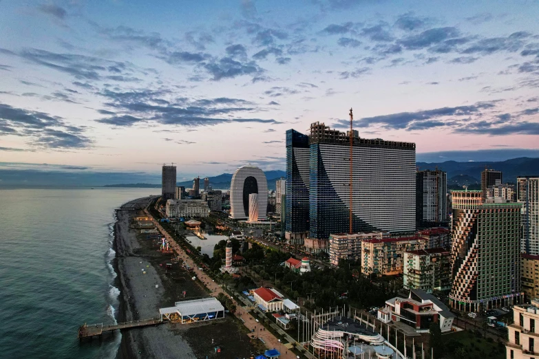 the cityscape and beach side of a city