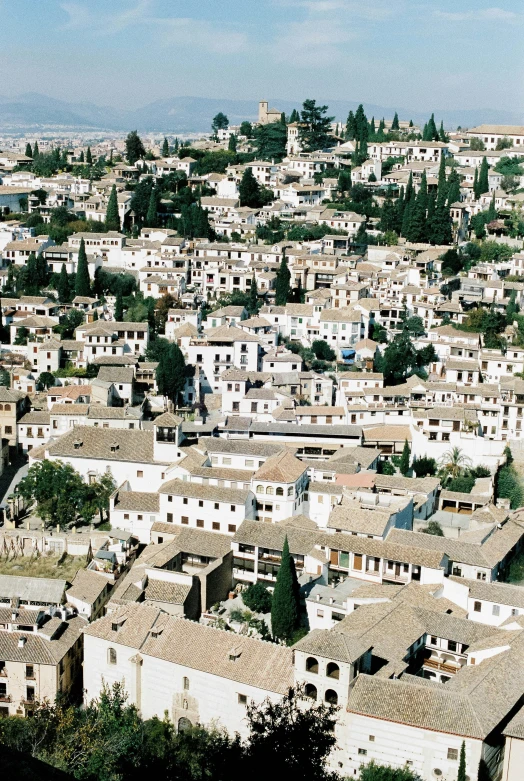 a small village is shown in the distance