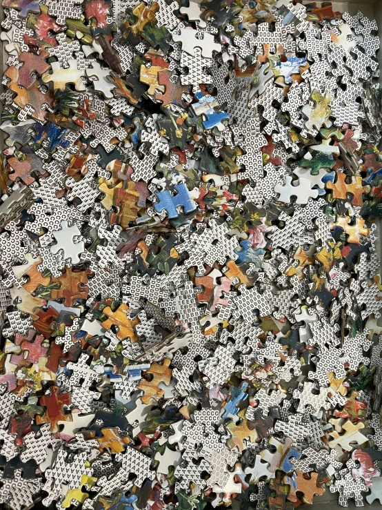 a mosaic style image of various different kinds of puzzle pieces