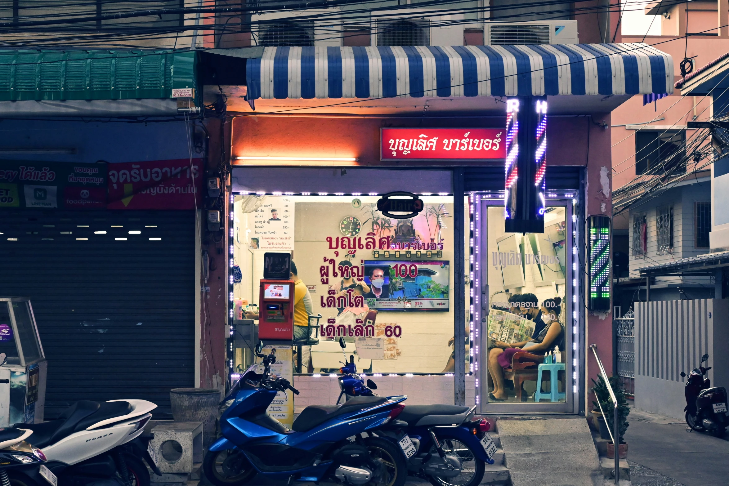 two scooters parked in front of a building