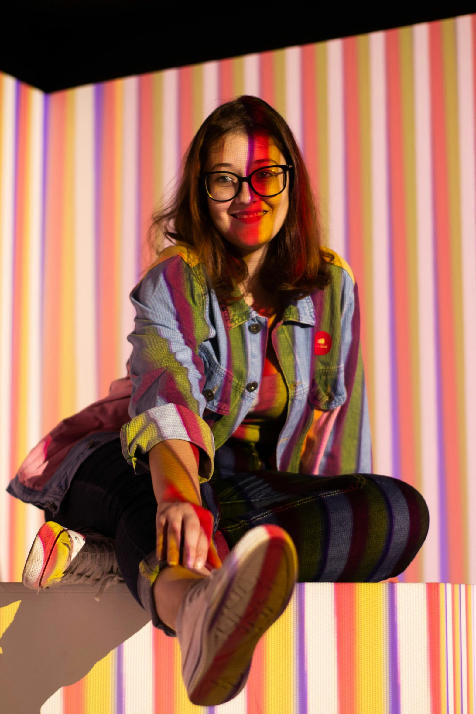 a girl with painted lips sits on a bench