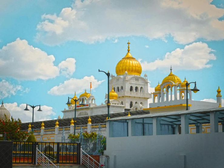 the buildings are adorned with golden domes