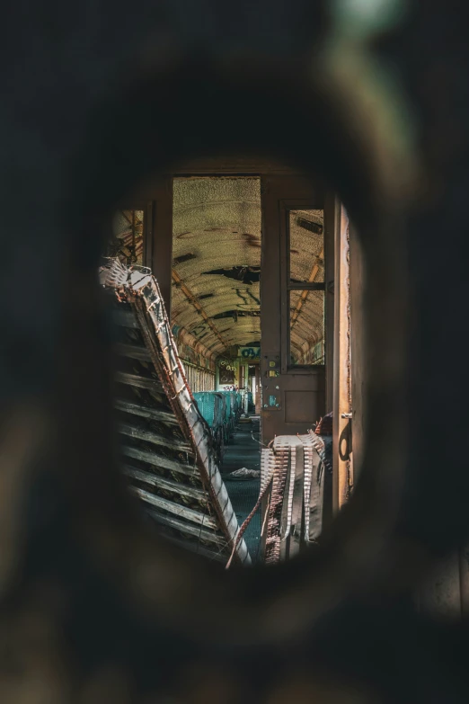 a view through a hole on a staircase