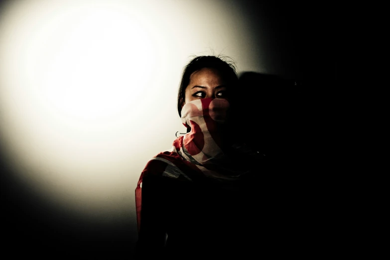 a woman with an american flag painted on her face