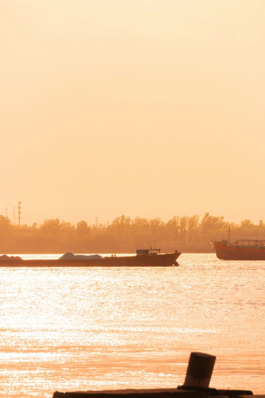 two boats in the ocean on the water