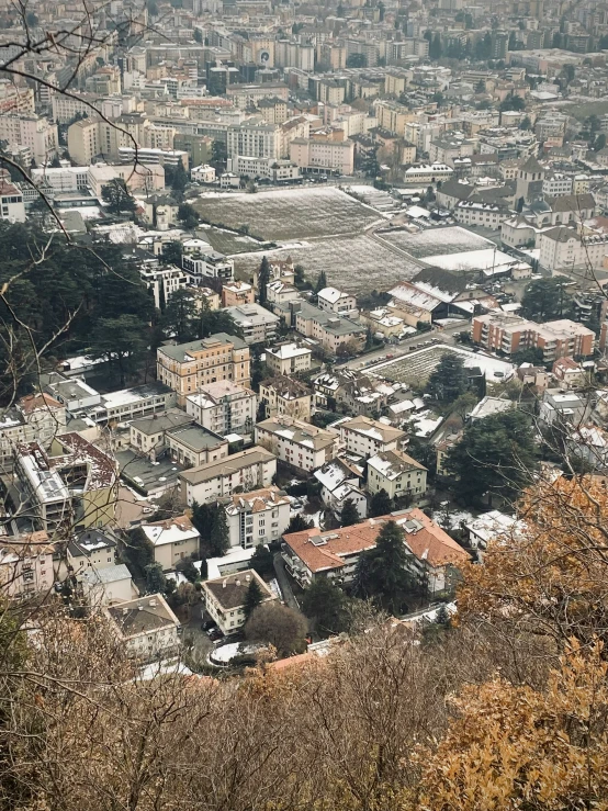 an aerial view of buildings and buildings next to trees