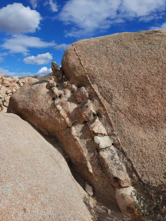 a rock with a big  at the base