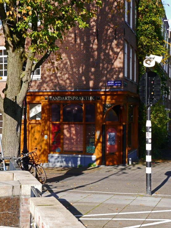 a bike is parked outside an empty restaurant