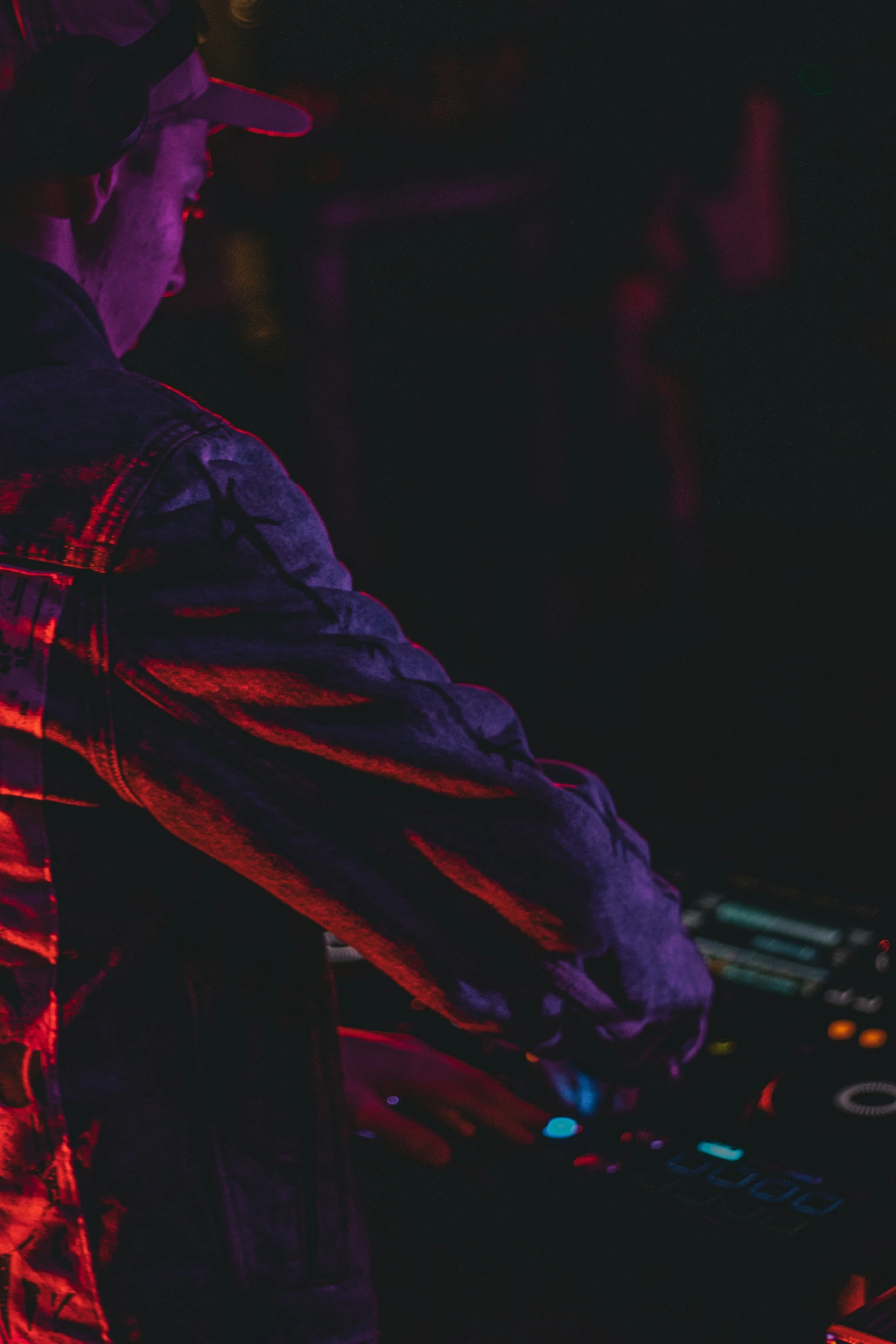 dj spinning up his turntable on the dance floor at a party