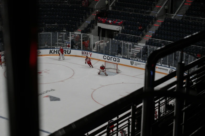 hockey rink taken from above as seen through railing