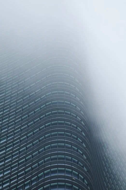 fog covers the facade of an office building in china