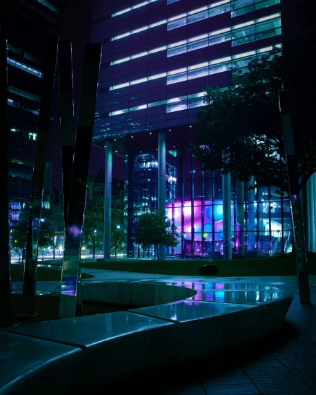 a lighted office building is shown at night