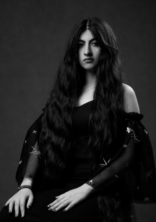 black and white image of woman with long hair