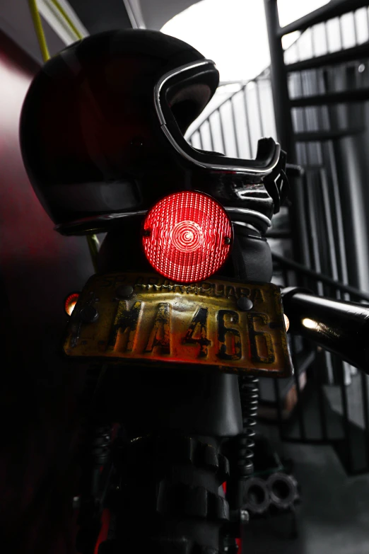 close up of motorcycle tail lights on black motorcycle