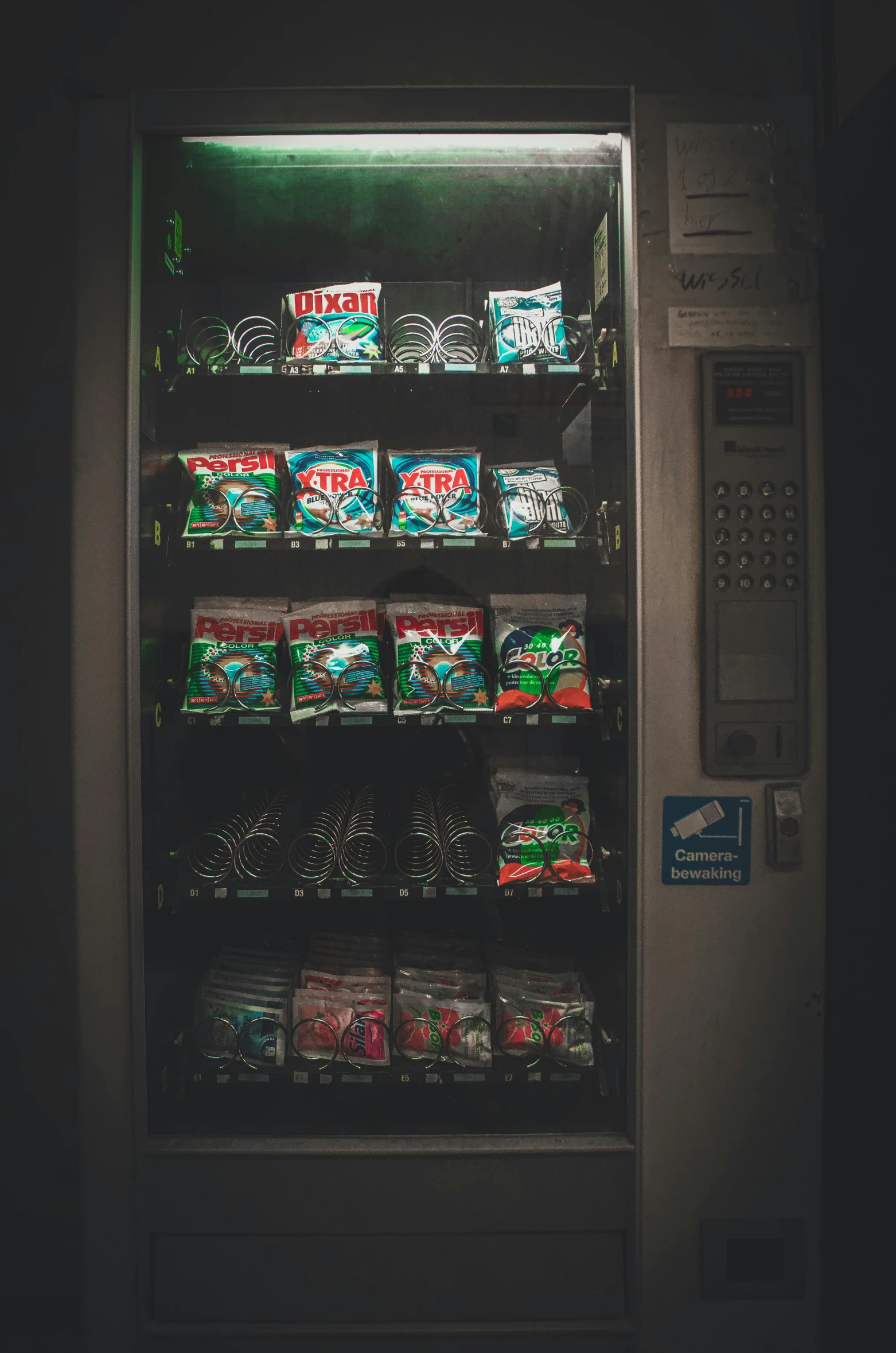 the vending machine is filled with food items